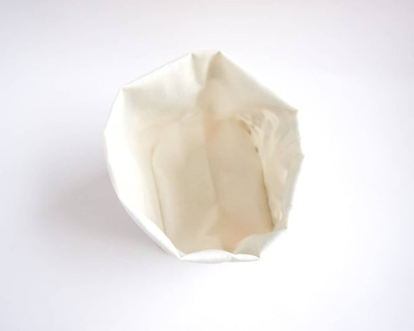 Intérieur du panier de rangement déco en tissu enduit imperméable utilisable pour les plantes
