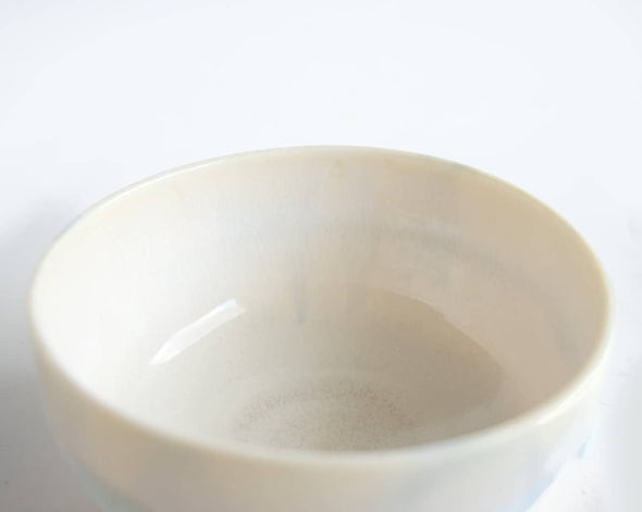 Bol céramique blanc bleu irisé