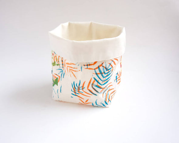 Panière de rangement bébé en tissu déco motifs feuilles multicolores créatrice Happé