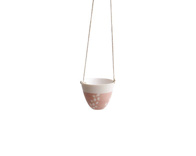 Pot suspendu unique en porcelaine rose motifs floraux blancs verticaux