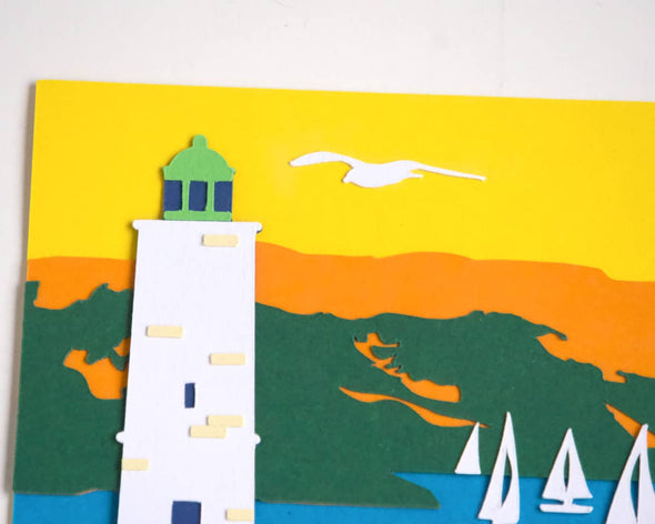 Zoom phare et montagne collages de la carte décorative murale ouvre Amandine Gaubert