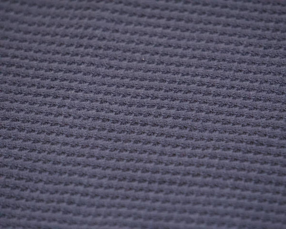 Zoom tissu nid d'abeille gaufré bleu verso serviette de table absorbant séchage rapide